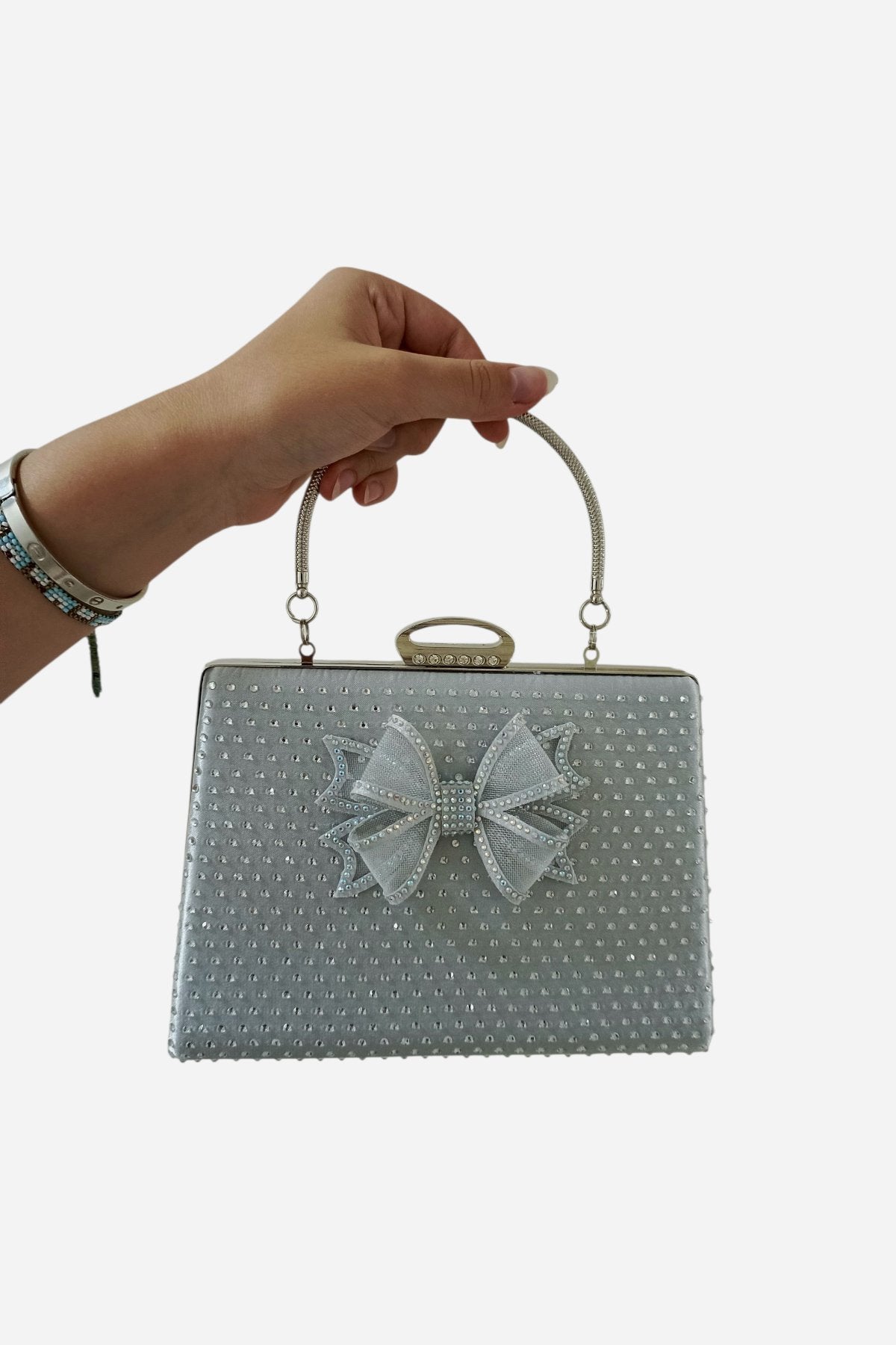 Silver bow with stones, custom designed and carefully crafted just for you.